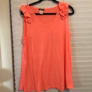 Bright peach tank with ruffles.